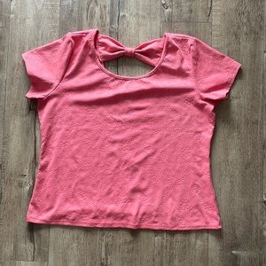 Woman’s blouse salmon color. No tags but size is XL